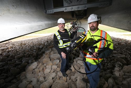 RUTH BONNEVILLE /  WINNIPEG FREE PRESS 

BIZ - drone regs

Photo of a specialized drone that is used to  inspect under bridges and survey work by   Photo taken under Dugald Rd. bridge over Floodway where have done inspection work.  
 

Story is about how  Transport Canada is instituting new regulation on operation of drones starting tomorrow which separates the licensed drone operators from other non-licensed drone pilots.  

See Martin Cash  | Business Reporter/ Columnist story. 

May 31, 2019
