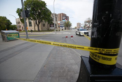 JOHN WOODS / WINNIPEG FREE PRESS
Police hold a scene on Portage and Spence in Winnipeg Sunday, June 2, 2019. A person was found assaulted at this location.

Reporter: