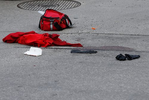 JOHN WOODS / WINNIPEG FREE PRESS
Belongings and blood mark the spot where police hold a scene on Portage at Spence in Winnipeg Sunday, June 2, 2019. A person was found assaulted near this location at Spence.

Reporter: