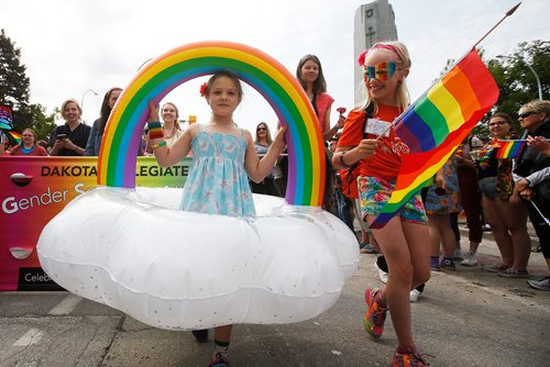 JOHN WOODS / WINNIPEG FREE PRESS
Saoirse Ford carries her rainbow at Pride parade in Winnipeg Sunday, June 2, 2019.

Reporter: