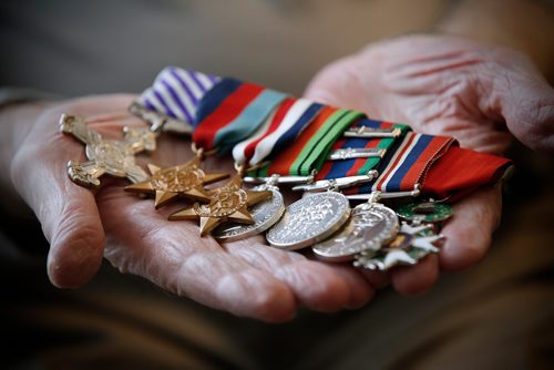 JOHN WOODS / WINNIPEG FREE PRESS
Jim Magill, a Royal Canadian Air Force veteran, is photographed holding his medals in his Winnipeg home Wednesday, May 29, 2019. He was in the air during D-Day.

Reporter: Kevin Rollason