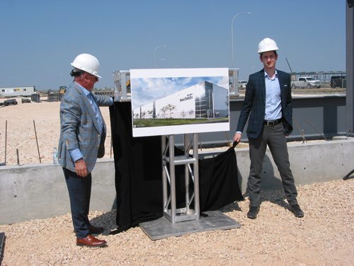 Canstar Community News May 29, 2019 - On May 29, (from left) Groupe Touchette founder Andre Touchette and Touchette's director of real estate Kevin Lutfy unveiled a drawing of the new tire distribution centre that is being constructed in CentrePort Canada's Brookside Industrial Park Phase III in the RM of Rosser.(ANDREA GEARY/CANSTAR COMMUNITY NEWS)