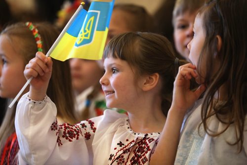 RUTH BONNEVILLE /  WINNIPEG FREE PRESS 

Local - Standup
MOU signing with Novopecherska School

Emily Walters, a kindergarten student from RF Morrison School, holds a Ukrainian flag with her classmates from K - 6 after singing the national anthem while attending the MOU signing with Novopecherska School at the Legislative Building on Monday. 


Standup photo 

June 3rd, 2019
