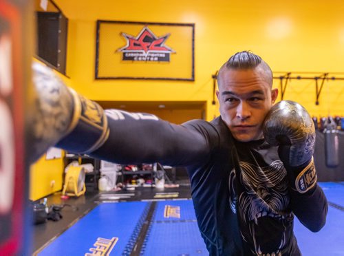 SASHA SEFTER / WINNIPEG FREE PRESS
Derek Pang suffered a traumatic brail injury in 2010 and was in a coma for three and a half days. Pang warms up by hitting a punching bag at the Canadian Fighting Centre. See Sabrina Carnevale story
190605 - Wednesday, June 05, 2019.