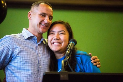 MIKAELA MACKENZIE / WINNIPEG FREE PRESS
Emcee and WASAC co-founder Kevin Chief (left) and previous program participant Danae Petti hug at the Youth CEO program kickoff at the Neeginan Centre in Winnipeg on Thursday, June 6, 2019. For Alex Paul story.  
Winnipeg Free Press 2019.