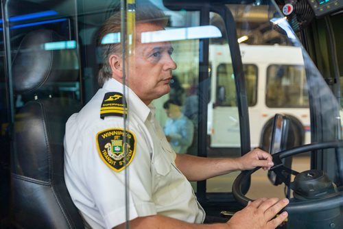 SASHA SEFTER / WINNIPEG FREE PRESS
Chief Timekeeper for Winnipeg Transit Blaine Early sits in a bus with a safety shield during a press conference to showcase newly-installed bus operator safety shields at the Winnipeg Transit Brandon Garage.
190606 - Thursday, June 06, 2019.