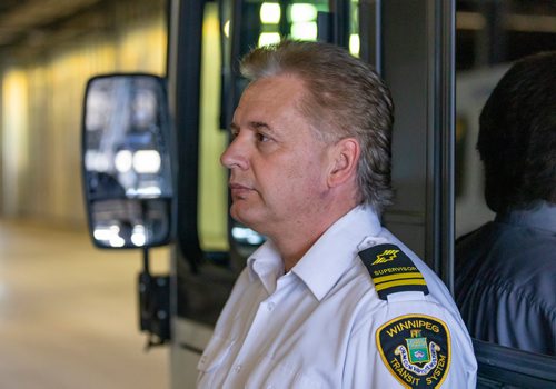 SASHA SEFTER / WINNIPEG FREE PRESS
Chief Timekeeper for Winnipeg Transit Blaine Early sits in a bus with a safety shield during a press conference to showcase newly-installed bus operator safety shields at the Winnipeg Transit Brandon Garage.
190606 - Thursday, June 06, 2019.