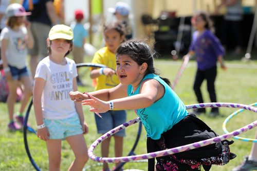 RUTH BONNEVILLE /  WINNIPEG FREE PRESS 

Standup - Kidsfest 

Kids learn how to hula hoop during the Teakle family Cirque workshop while attending the 37th annual Kidsfest at the Forks Thursday.  Event runs from June 6 to 9th. 


June 6th, 2019
