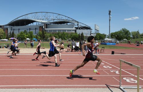 SASHA SEFTER / WINNIPEG FREE PRESS
Remy Burnett (closest) wins his 100m race heat during the MHSAA Provincial Track and Field meet held on the University of Manitoba campus.
190606 - Thursday, June 06, 2019.