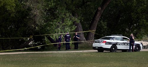 PHIL HOSSACK / WINNIPEG FREE PRESS - Police investigate a crime scene near the Forks Historic Site Friday afternoon. See Rollison's story. - June 7, 2019.