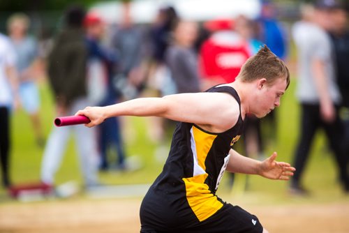 MIKAELA MACKENZIE / WINNIPEG FREE PRESS
Cole Nichols runs in the first 4X100 unified relay at the MHSAA Dairy Farmers of Manitoba Track & Field Championships at University Stadium in Winnipeg on Saturday, June 8, 2019. For Devon story.  
Winnipeg Free Press 2019.