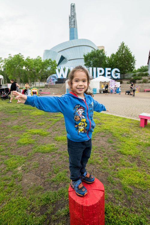 Mike Sudoma / Winnipeg Free Press
Robby smiling away and having fun in the rain at Kids Fest in the Forks Saturday afternoon. June 8 2019