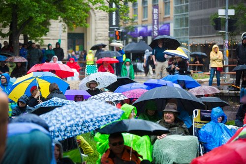 MIKAELA MACKENZIE / WINNIPEG FREE PRESS
A sea of umbrellas during the Sweet Alibi set at the Rise Up 100: Songs for the Next Century Concert at Old Market Square in Winnipeg on Saturday, June 8, 2019. For Nadya story.  
Winnipeg Free Press 2019.