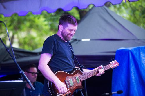 MIKAELA MACKENZIE / WINNIPEG FREE PRESS
John K. Samson plays at the Rise Up 100: Songs for the Next Century Concert at Old Market Square in Winnipeg on Saturday, June 8, 2019. For Nadya story.  
Winnipeg Free Press 2019.