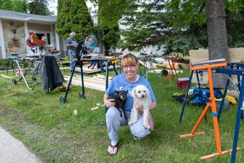 SASHA SEFTER / WINNIPEG FREE PRESS
Animal welfare activist Janelle McLeod with her dogs Pint (left) and Pebbles. McLeod started an initiative called the Warming Hearts Project which aims to build and deliver insulated doghouses to northern communities in need.
190609 - Sunday, June 09, 2019.