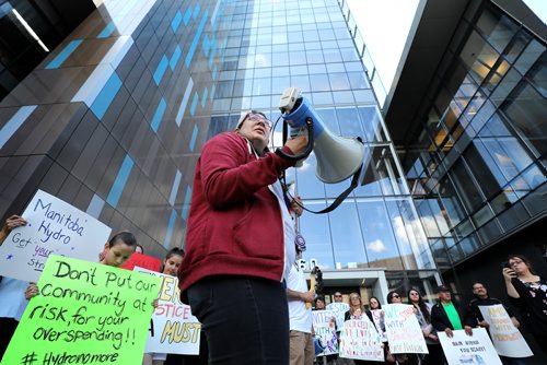 RUTH BONNEVILLE /  WINNIPEG FREE PRESS 

LOCAL - AMC Hydro rally

Sadie-Phoenix Lavoie, community coordinator with Waniskatan (An Alliance of Hydro-Impacted Communities), speaks in protest in front of the Hydro building with supporters after rally walk from the AMC office at 275 Portage Avenue to the Manitoba Hydro building at 360 Portage Avenue in response to Manitoba Hydros imposed changes to the supervised operating hours at the Grand Rapids Generating Station Monday.

See Ashley Prest story. 

June 10th, 2019
