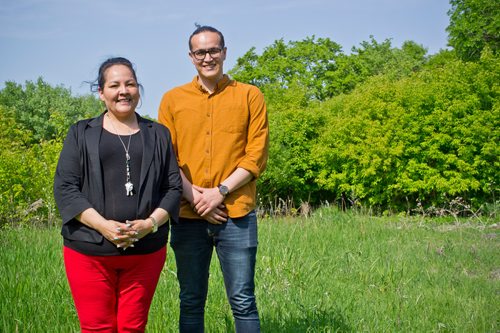 Canstar Community News June 3, 2019 - Stephanie Zamora, vice president of human resources and indigenous initiatives at Macdonald Youth Services, and Daman Morissette, manager of indigenous initiatives, are pictured on MYS grounds on the bank of the Assiniboine River. The land will be transformed into a teaching garden and ceremonial ground as part of MYS' Planting Seeds of Reconciliation' project. The redevelopment is estimated to cost over $80,000. (DANIELLE DA SILVA/SOUWESTER/CANSTAR)