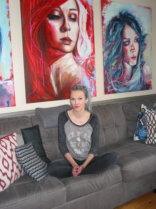 Canstar Community News May 29, 2019 - Headingley artist Rey Fritsch is shown with some of her colourful paintings of female subjects. (ANDREA GEARY/CANSTAR COMMUNITY NEWS)