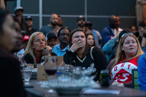 SASHA SEFTER / WINNIPEG FREE PRESS
Raptors fans gather to watch game five against the Golden State Warriors on the rooftop patio of the Metropolitan Entertainment Centre.
190610 - Monday, June 10, 2019.