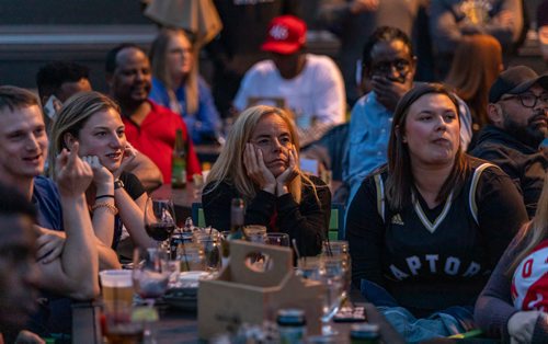 SASHA SEFTER / WINNIPEG FREE PRESS
Raptors fans gather to watch game five against the Golden State Warriors on the rooftop patio of the Metropolitan Entertainment Centre.
190610 - Monday, June 10, 2019.