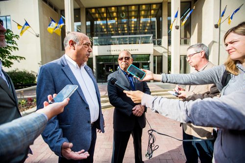 MIKAELA MACKENZIE / WINNIPEG FREE PRESS
 Aleem Chaudhary, ATU 1505 president, speaks to the media with John Costa, ATU International president, outside of City Hall in Winnipeg on Tuesday, June 11, 2019. For Aldo story.  
Winnipeg Free Press 2019.