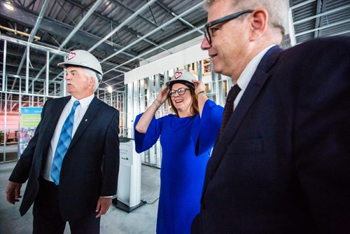 MIKAELA MACKENZIE / WINNIPEG FREE PRESS
Jim Bell, CEO of Siloam Mission (left), Heather Stefanson, families minister, and Adam Vaughan, parliamentary secretary to the federal minister of families, children and social development, chat before a press conference in Winnipeg on Tuesday, June 11, 2019. For Jessica Botelho-Urbanski story.  
Winnipeg Free Press 2019.