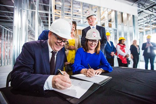 MIKAELA MACKENZIE / WINNIPEG FREE PRESS
Adam Vaughan, parliamentary secretary to the federal minister of families, and  children and social development, and Heather Stefanson, families minister, sign a new bilateral national housing strategy at a press conference in Winnipeg on Tuesday, June 11, 2019. For Jessica Botelho-Urbanski story.  
Winnipeg Free Press 2019.