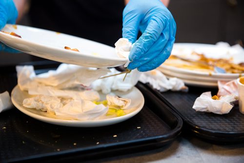 MIKAELA MACKENZIE / WINNIPEG FREE PRESS
Heather Baril, cleaning staff, sorts and scrapes plates at The Forks in Winnipeg on Tuesday, June 11, 2019. The Forks recently replaced dishware with 100% reusable and compostable products in its path towards a zero-waste goal. For Tessa Vanderhart story.  
Winnipeg Free Press 2019.