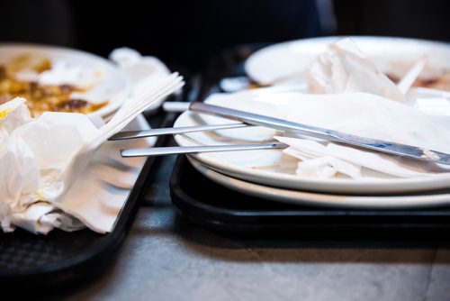 MIKAELA MACKENZIE / WINNIPEG FREE PRESS
Heather Baril, cleaning staff, sorts and scrapes plates at The Forks in Winnipeg on Tuesday, June 11, 2019. The Forks recently replaced dishware with 100% reusable and compostable products in its path towards a zero-waste goal. For Tessa Vanderhart story.  
Winnipeg Free Press 2019.