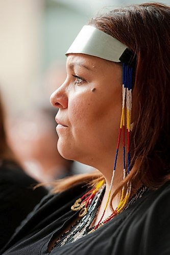 Mike Sudoma / Winnipeg Free Press
Inuit throat singer, Nikki Komaksiutiksak watching the event after her throat singing performance with her two daughters Wednesday afternoon
June 12 2019