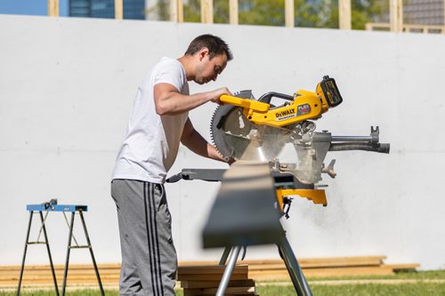 SASHA SEFTER / WINNIPEG FREE PRESS
Nick Kalturnyk cuts boards for a temporary venue in Parc Elzear Goulet in St. Boniface.
190613 - Thursday, June 13, 2019.