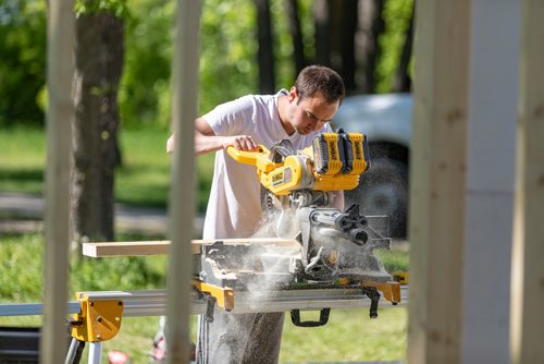 SASHA SEFTER / WINNIPEG FREE PRESS
Nick Kalturnyk cuts boards for a temporary venue in Parc Elzear Goulet in St. Boniface.
190613 - Thursday, June 13, 2019.