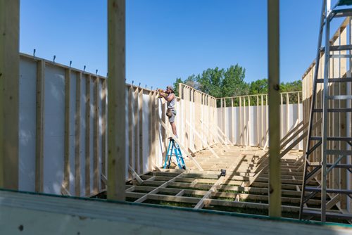 SASHA SEFTER / WINNIPEG FREE PRESS
Patrick Anderson works on the roof of a temporary venue in Parc Elzear Goulet in St. Boniface.
190613 - Thursday, June 13, 2019.