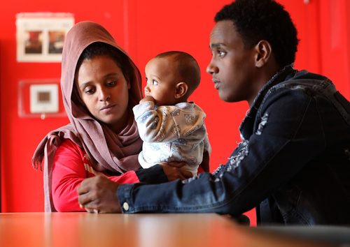 RUTH BONNEVILLE /  WINNIPEG FREE PRESS 

LOCAL - LOCAL - Eritreans

Portrait of young Eritrean family who were abducted and held in very confined corridors with other Eritreans and about to be sold human trafficking trade before being rescued.
   
Photo of Luam Yebiyom (Mother),  Abdurahman Saleh (Husband) and their young child,  Etram Abdurahman (daughter 9m). 

Story: Eritreans were stuck in nightmarish Libya and rescued thanks to Wpg human rights group with the chairman of the Eritrean-Canadian Human Rights Group in Manitoba, 

Carol Sanders  | Reporter

June 13th, 2019
