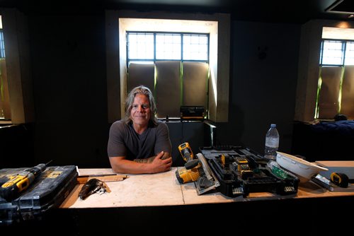 PHIL HOSSACK / WINNIPEG FREE PRESS - Danny Swidinsky leans onto the "longest bar in the city" at his St James Hotel is under complete from the floor joists up renovations. See story. - June 14 2019.
