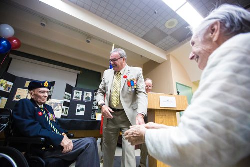 MIKAELA MACKENZIE / WINNIPEG FREE PRESS
Former corporal Ian Wilson receives the Legion of Honour from honourary French consulate Bruno Burnichon while his wife, Betty Wilson (right), claps at Deer Lodge Centre in Winnipeg on Saturday, June 15, 2019. For Caitlin Gowriluk story.
Winnipeg Free Press 2019.