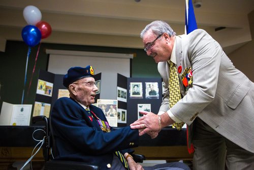 MIKAELA MACKENZIE / WINNIPEG FREE PRESS
Former corporal Ian Wilson receives the Legion of Honour from honourary French consulate Bruno Burnichon at Deer Lodge Centre in Winnipeg on Saturday, June 15, 2019. For Caitlin Gowriluk story.
Winnipeg Free Press 2019.