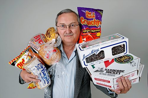 BORIS.MINKEVICH@FREEPRESS.MB.CA BORIS MINKEVICH / WINNIPEG FREE PRESS  090608 Jerry Stubbs owns Nostalgia Foods. Here he poses with some of the many foods he ships.