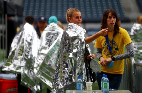 TREVOR HAGAN / WINNIPEG FREE PRESS
At the finish line of the Manitoba Marathon inside IG Field, Sunday, June 16, 2019.