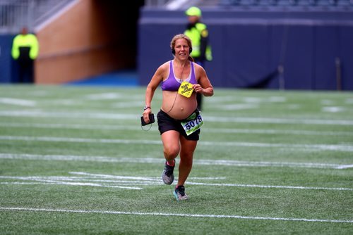 TREVOR HAGAN / WINNIPEG FREE PRESS
Reesa Simmonds, part of an all-pregnant relay team. At the finish line of the Manitoba Marathon inside IG Field, Sunday, June 16, 2019.