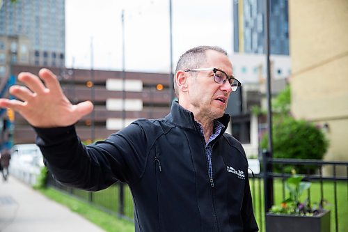 MIKAELA MACKENZIE / WINNIPEG FREE PRESS
True North SVP of Venues & Entertainment Kevin Donnelly points out the future patio space in front of the Burton Cummings Theatre in Winnipeg on Monday, June 17, 2019. For Kevin Rollason story.
Winnipeg Free Press 2019.