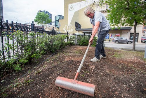 MIKAELA MACKENZIE / WINNIPEG FREE PRESS
Edward Bell, owner/contractor of Bell's Property Services, cleans up the future patio space in front of the Burton Cummings Theatre in Winnipeg on Monday, June 17, 2019. For Kevin Rollason story.
Winnipeg Free Press 2019.