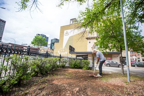 MIKAELA MACKENZIE / WINNIPEG FREE PRESS
Edward Bell, owner/contractor of Bell's Property Services, cleans up the future patio space in front of the Burton Cummings Theatre in Winnipeg on Monday, June 17, 2019. For Kevin Rollason story.
Winnipeg Free Press 2019.