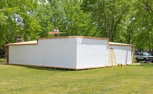 SASHA SEFTER / WINNIPEG FREE PRESS
Patrick Anderson works on the roof of a temporary venue in Parc Elzear Goulet in St. Boniface.
190617 - Monday, June 17, 2019.