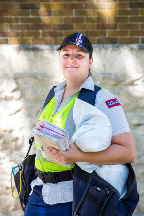 MIKAELA MACKENZIE / WINNIPEG FREE PRESS
Basia Sokal, former leader of the Winnipeg Labour Council who's since gone back to her job as a postal worker, on her route in West Broadway in Winnipeg on Monday, June 17, 2019. For Jessica Botelho-Urbanski story.
Winnipeg Free Press 2019.