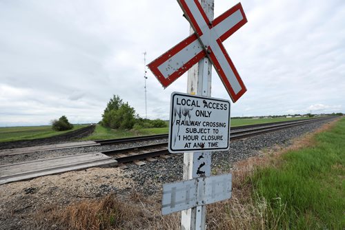 RUTH BONNEVILLE /  WINNIPEG FREE PRESS 

A 15-year-old boy is dead after a train and the dirt bike he was riding collided on Spruce Rd.  just one mile east of  Oakbank, Man. on Sunday evening.  

Photo taken from north side of tracks looking south west. 
 
See Tessa Vanderhart story. 

June 17th, 2019
