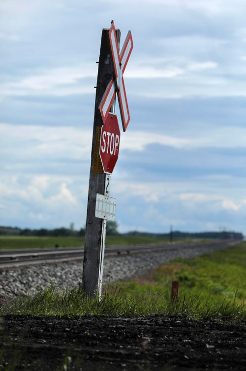 RUTH BONNEVILLE /  WINNIPEG FREE PRESS 

A 15-year-old boy is dead after a train and the dirt bike he was riding collided on Spruce Rd.  just one mile east of  Oakbank, Man. on Sunday evening.  

Photo taken from south side of tracks looking toward the east.  

See Tessa Vanderhart story. 

June 17th, 2019
