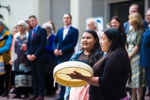 MIKAELA MACKENZIE / WINNIPEG FREE PRESS
Christine Slater (right) and Ariel Spence sing a song for the signatory procession at the third annual ceremony for signing Winnipeg's Indigenous Accord at City Hall in Winnipeg on Tuesday, June 18, 2019. For Aldo Santin story.
Winnipeg Free Press 2019.