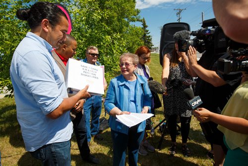 MIKE DEAL / WINNIPEG FREE PRESS
Helen Zaharkiw, a local senior who personally gathered 4,000 signatures talks to the media after handing the petition to NDP Leader Wab Kinew.
Members of the Save Seven Oaks ER Coalition, along with Seven Oaks health care workers and supporters present a petition with over 7,500 signatures to NDP Leader Wab Kinew calling on the Pallister government to keep the Seven Oaks ER open during a rally on the boulevard along McPhilips close to the Seven Oaks hospital Tuesday afternoon.
190618 - Tuesday, June 18, 2019.