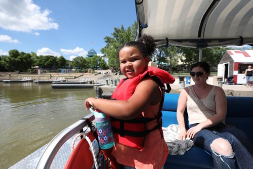 RUTH BONNEVILLE /  WINNIPEG FREE PRESS 

Standup photo 

Khaleesi Mchangamwe (5yrs) looks over the front of the Splash Dash boat just before it heads out on a tour of the area while hanging out with her auntie Melanie Brandow  at the Forks on Tuesday.

Standup photo 

June 18th, 2019
